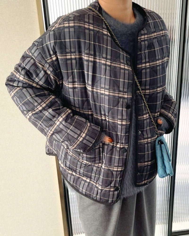 Lässige karierte Steppjacke