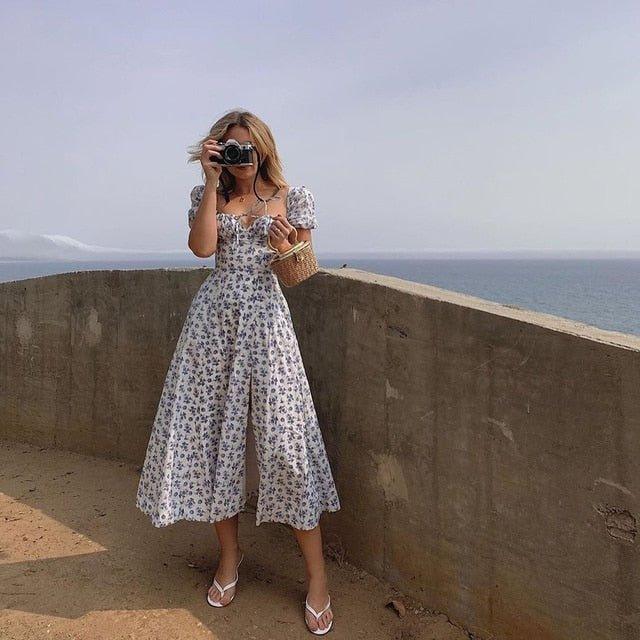 Florales Midi-Kleid mit Puffärmeln und Schlitz