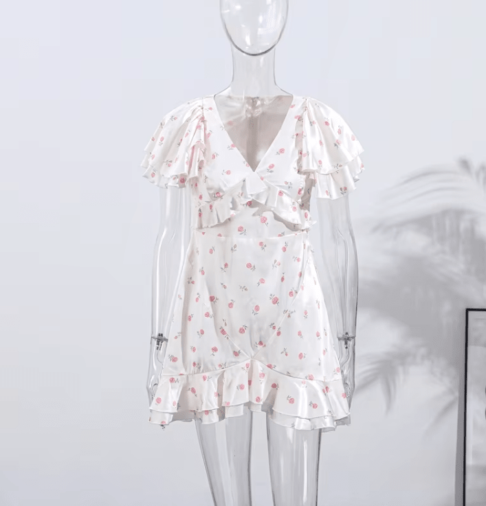 Blumiges Minikleid mit Puffärmeln